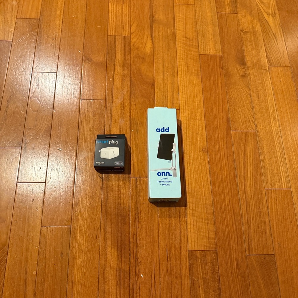Onn. Smart Plug and Phone Stand Set